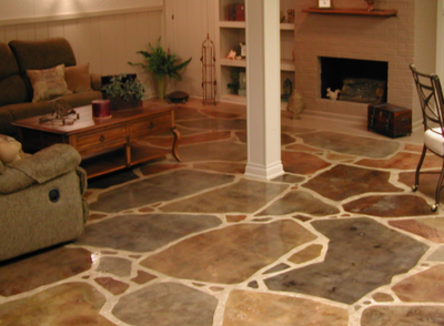 One of a kind decorative interior floor made from multi-colored stained concrete.