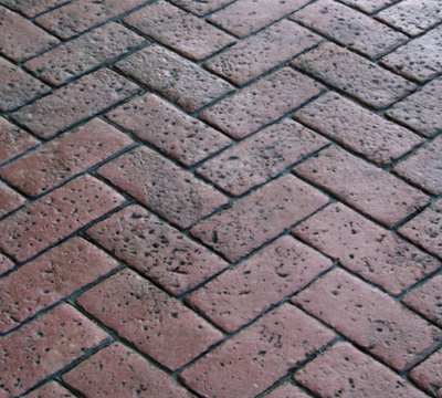 Zigzag patterned brick paver designed stamped concrete.
