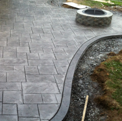 Stamped concrete patio with built in fire pit